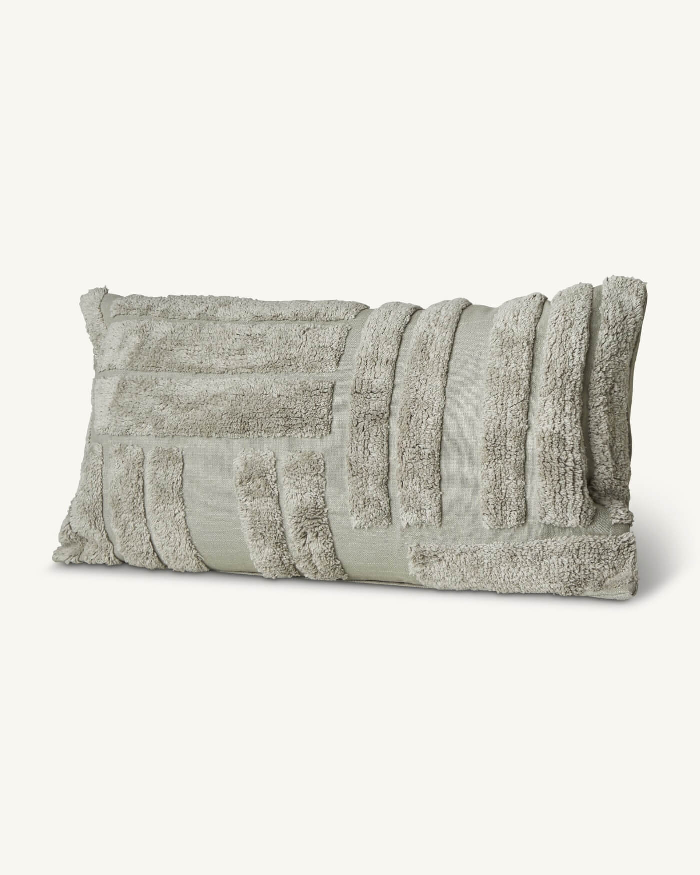 Tufted lumbar outlet pillow